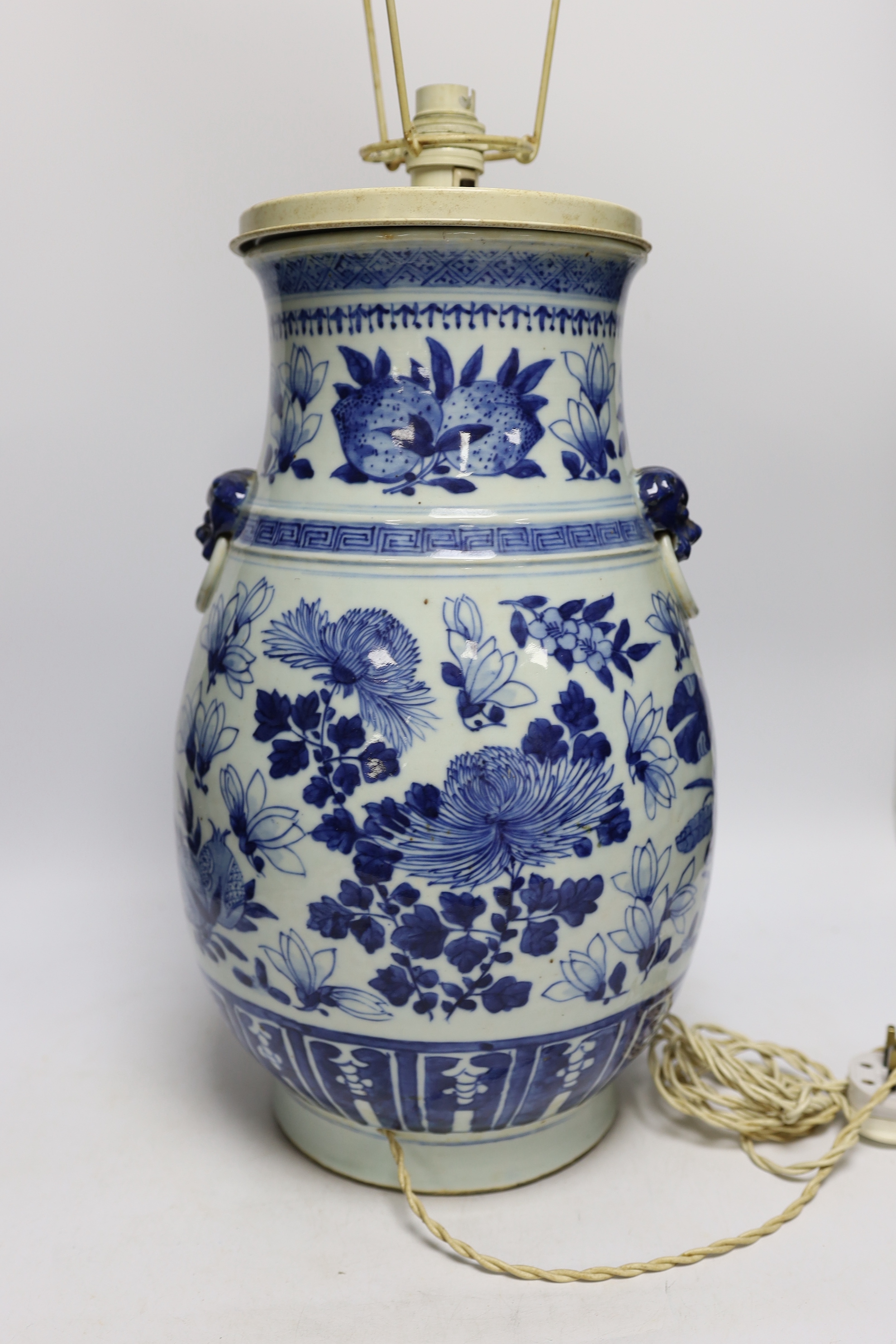 A late 19th century Chinese export porcelain blue and white Hu vase, painted with peaches (converted to a table lamp, drilled), vase 38.5cm